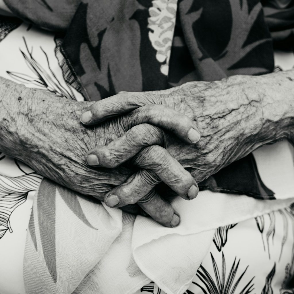 Close-up of clasped hands